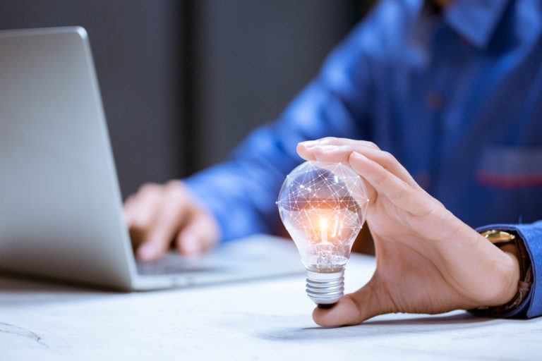 Business Hand Holding Light Bulb With Brain Icon Creativity Innovative Are Keys Success New Ideas Innovation Concept - OFFICE CONT - Contabilidade Digital para você e sua empresa