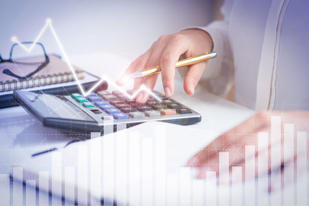 Accountant Calculating Profit With Financial Analysis Graphs - OFFICE CONT - Contabilidade Digital para você e sua empresa