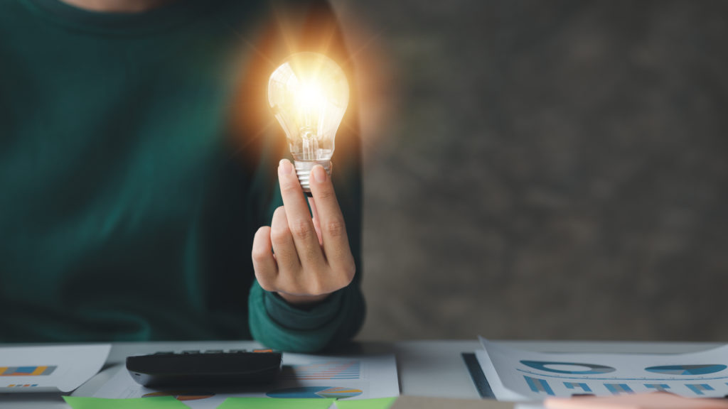 Woman Holding Glowing Lamp, Creative New Idea. Innovation, Brain - OFFICE CONT - Contabilidade Digital para você e sua empresa